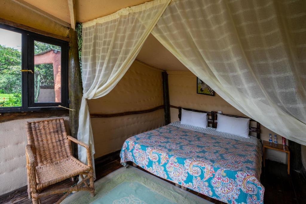 Postel nebo postele na pokoji v ubytování Punda Milias Lodge