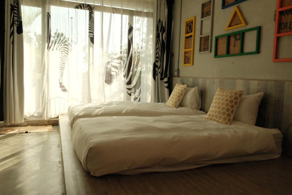 Postel nebo postele na pokoji v ubytování Summer Delight B&B