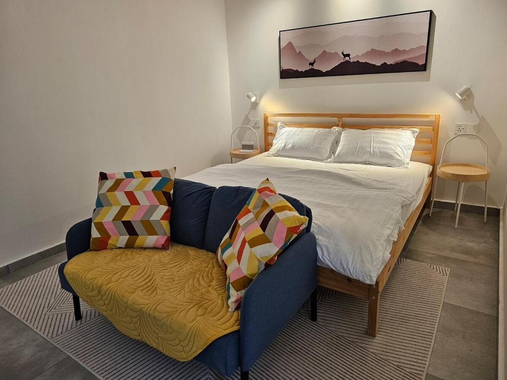 Postel nebo postele na pokoji v ubytování W7 Residence Kundasang