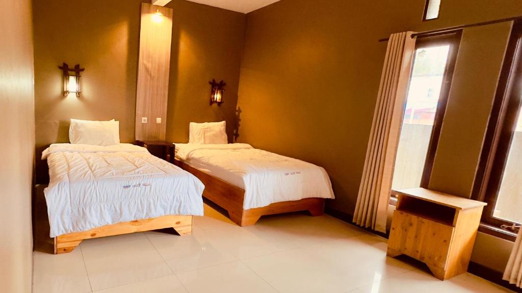 Letto o letti in una camera di Sky View Bromo Guest House