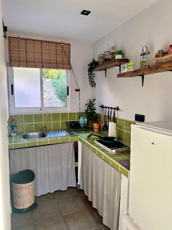 A kitchen or kitchenette at Sunshine loft