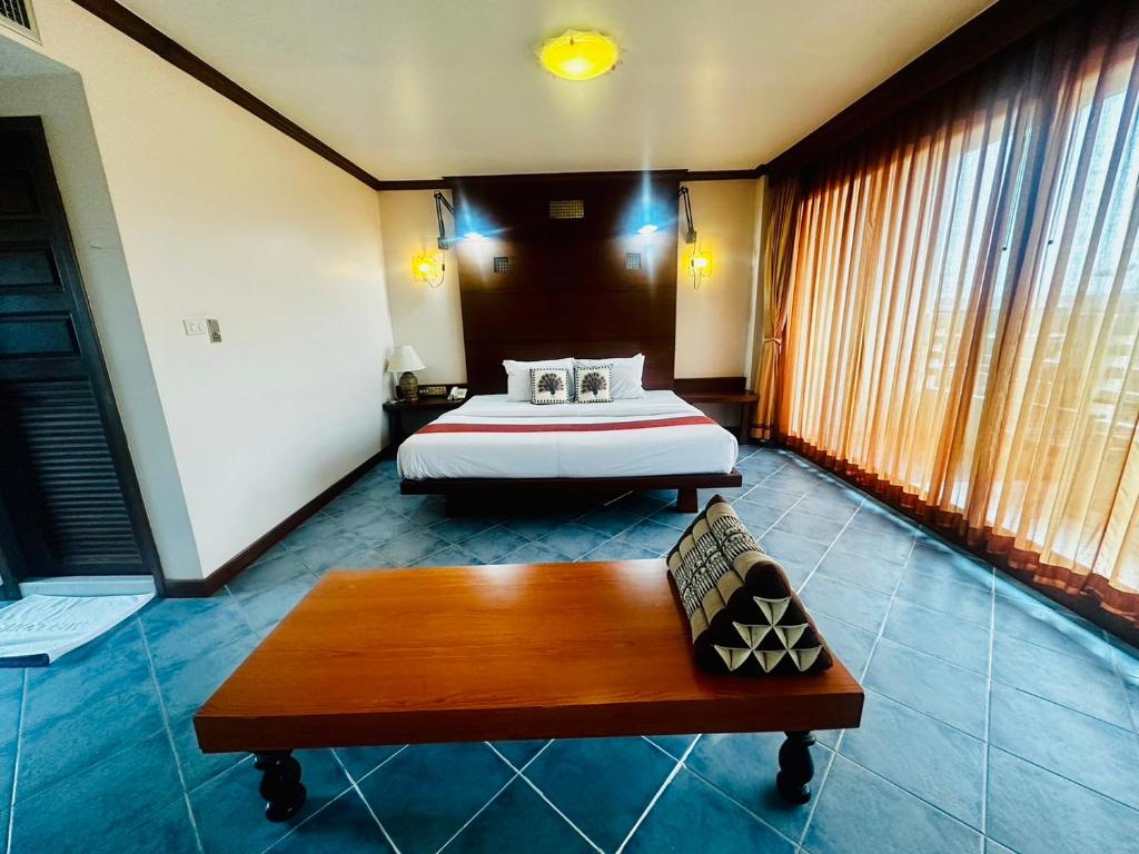 Postel nebo postele na pokoji v ubytování Hua Hin Loft