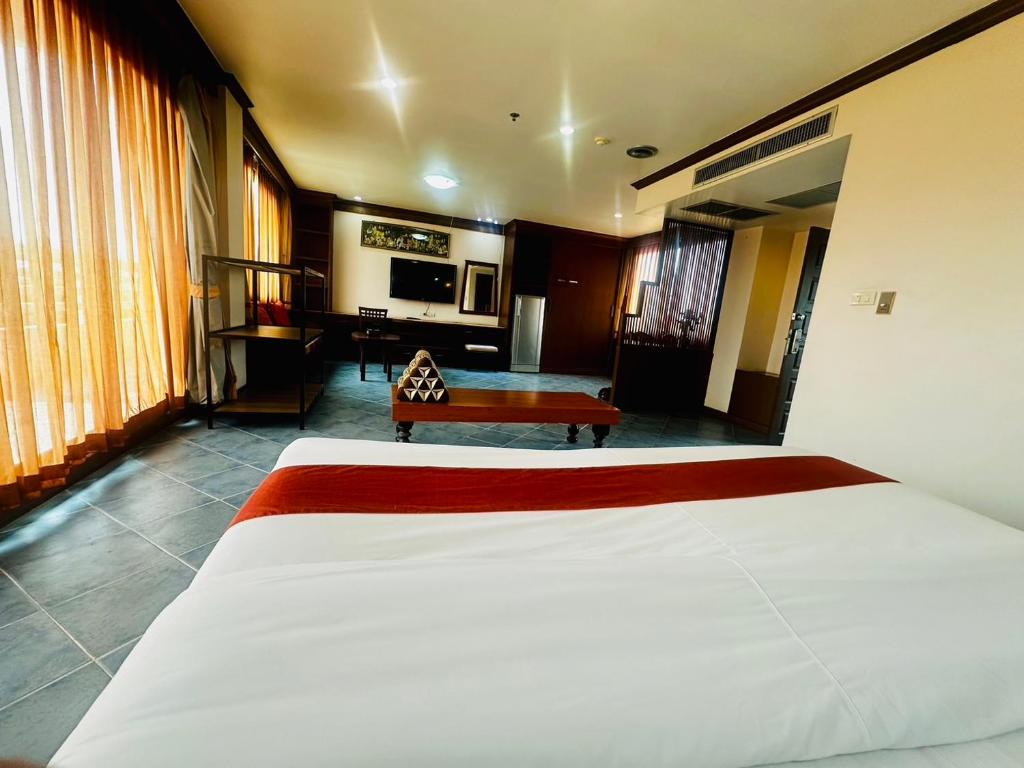 Postel nebo postele na pokoji v ubytování Hua Hin Loft