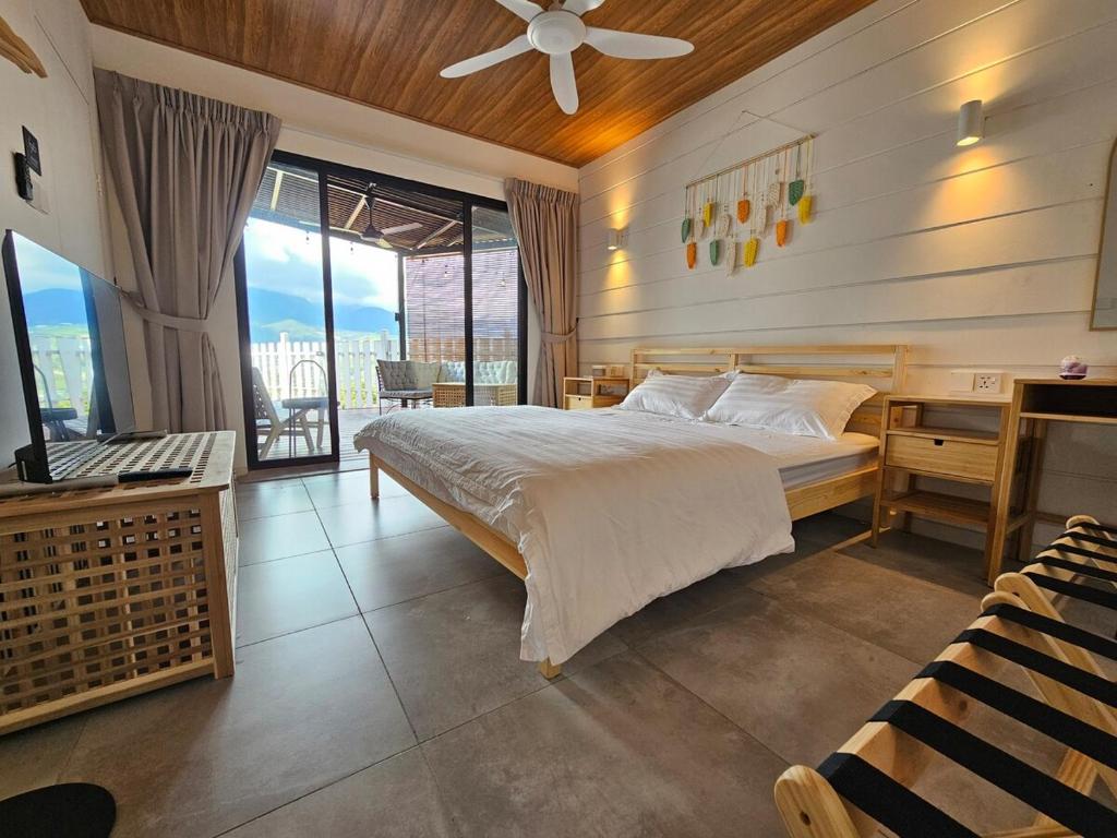 Ένα ή περισσότερα κρεβάτια σε δωμάτιο στο W8 Residence Kundasang