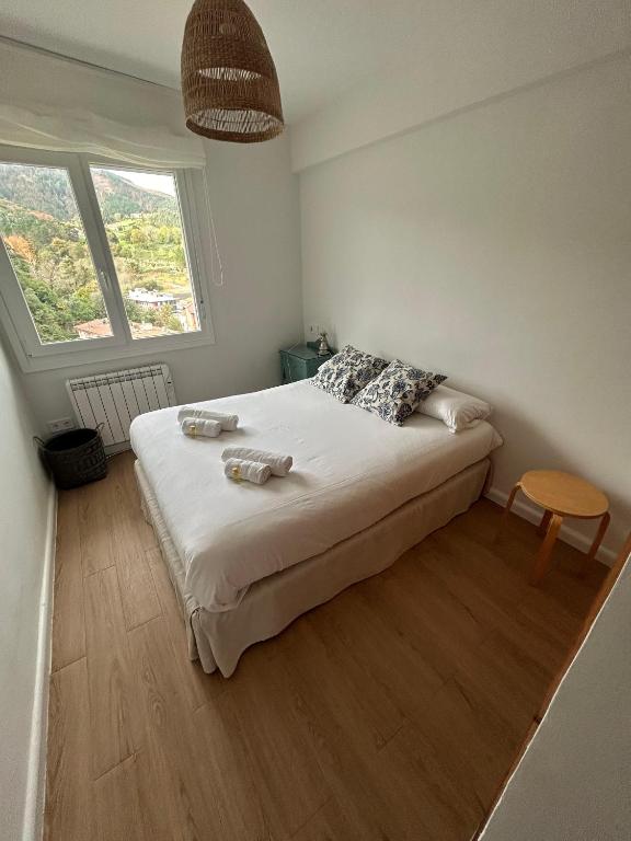 Postel nebo postele na pokoji v ubytování El Mirador de Urdaibai