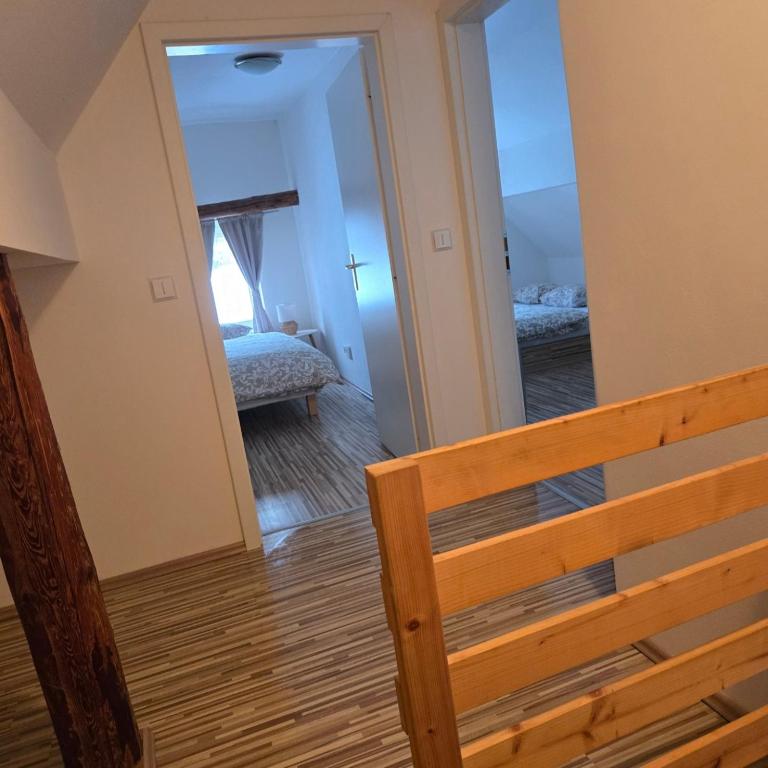 Postel nebo postele na pokoji v ubytování Apartmány Hertvinka