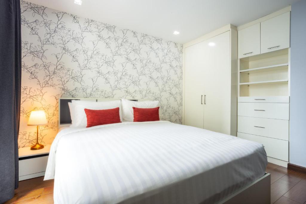 Postel nebo postele na pokoji v ubytování Citismart Luxury Apartments