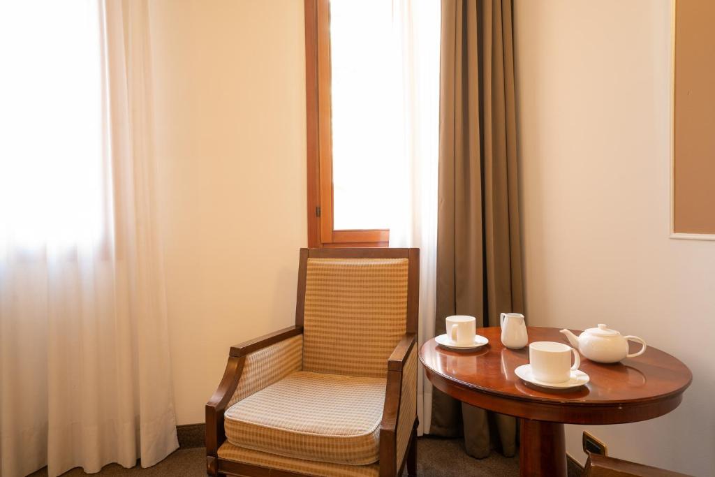 A seating area at Alla Corte Rossa