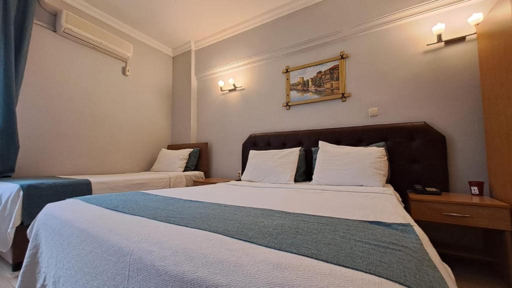 Ένα ή περισσότερα κρεβάτια σε δωμάτιο στο Elite Hotel City Center Corlu Bed and Breakfast
