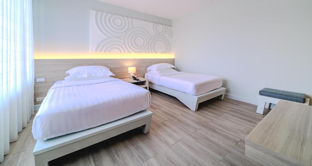 Postel nebo postele na pokoji v ubytování Best Western Chaweng Samui