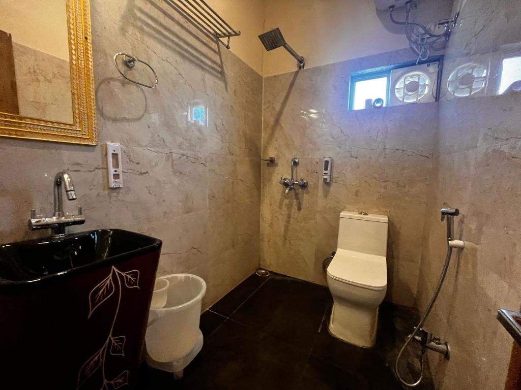 Vannituba majutusasutuses Sambha Hotel