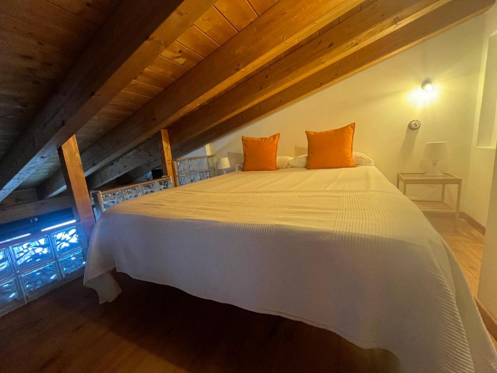 Postel nebo postele na pokoji v ubytování Buhardilla Con Encanto Centro Historico
