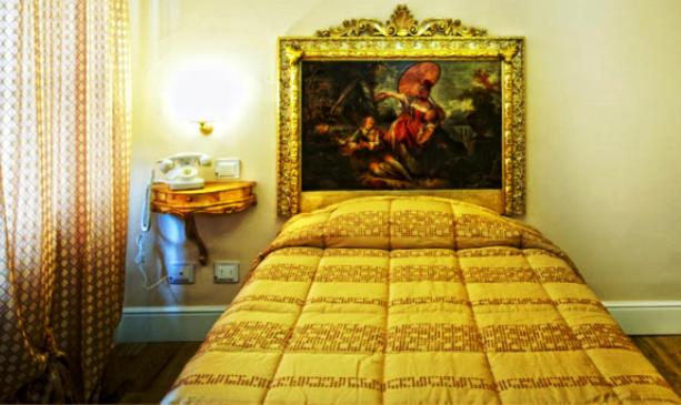 Postel nebo postele na pokoji v ubytování Boutique Hotel L'Imperatrice