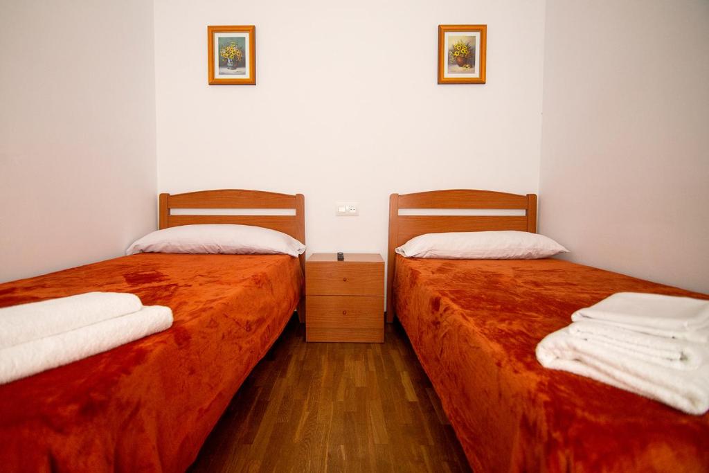 Postel nebo postele na pokoji v ubytování Yani's Hospedaje Pension 1 estrella