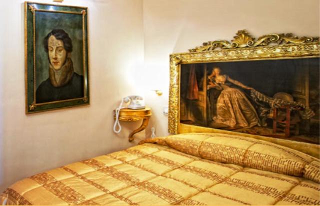 Postel nebo postele na pokoji v ubytování Boutique Hotel L'Imperatrice