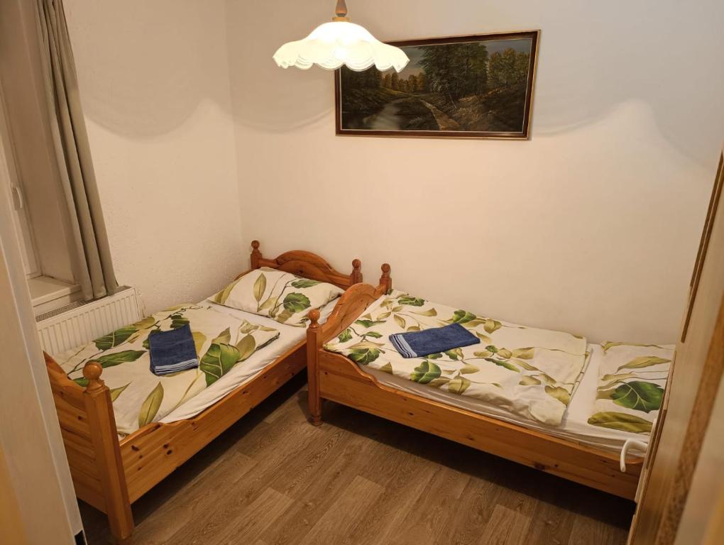 Postel nebo postele na pokoji v ubytování Penzion Fajn Klub