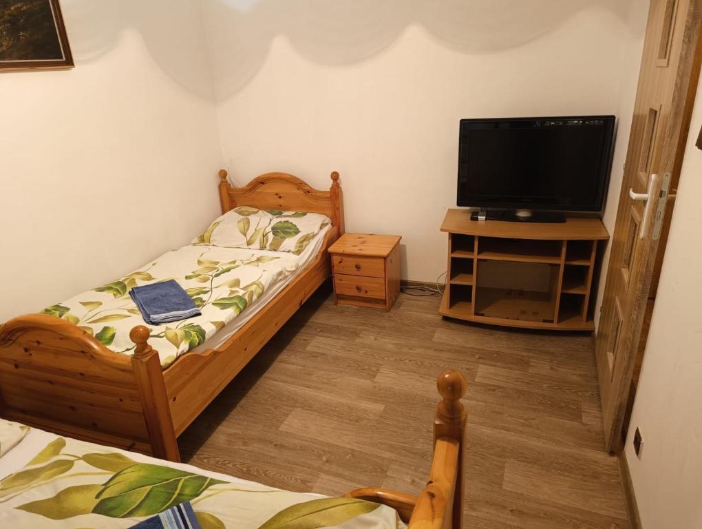 Postel nebo postele na pokoji v ubytování Penzion Fajn Klub