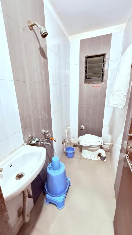 Koupelna v ubytování HOTEL GRKK - Near Shri Saibaba Samadhi Temple Shirdi