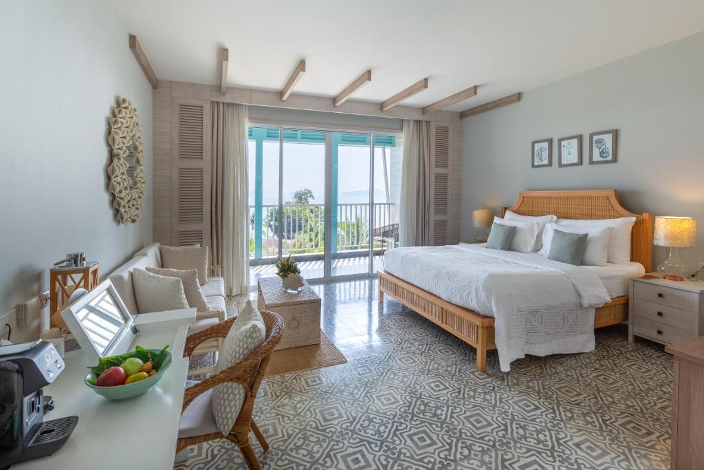 Postel nebo postele na pokoji v ubytování Cape Kudu Hotel, Koh Yao Noi