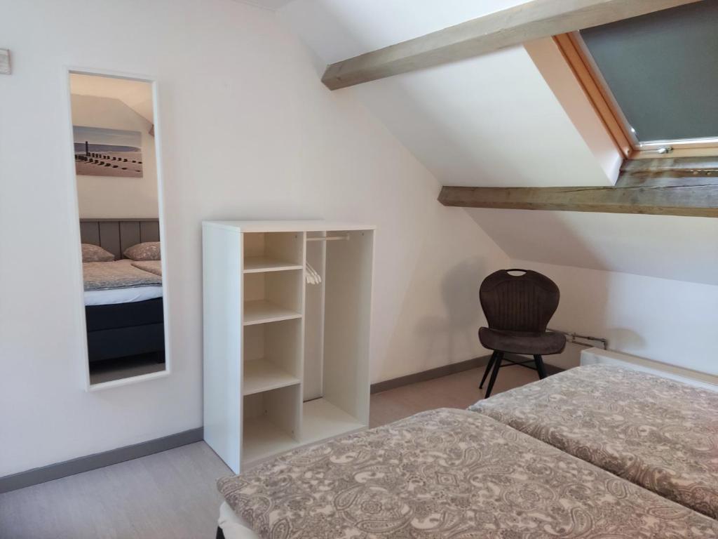 Postel nebo postele na pokoji v ubytování B&B Bouwmanshoeve