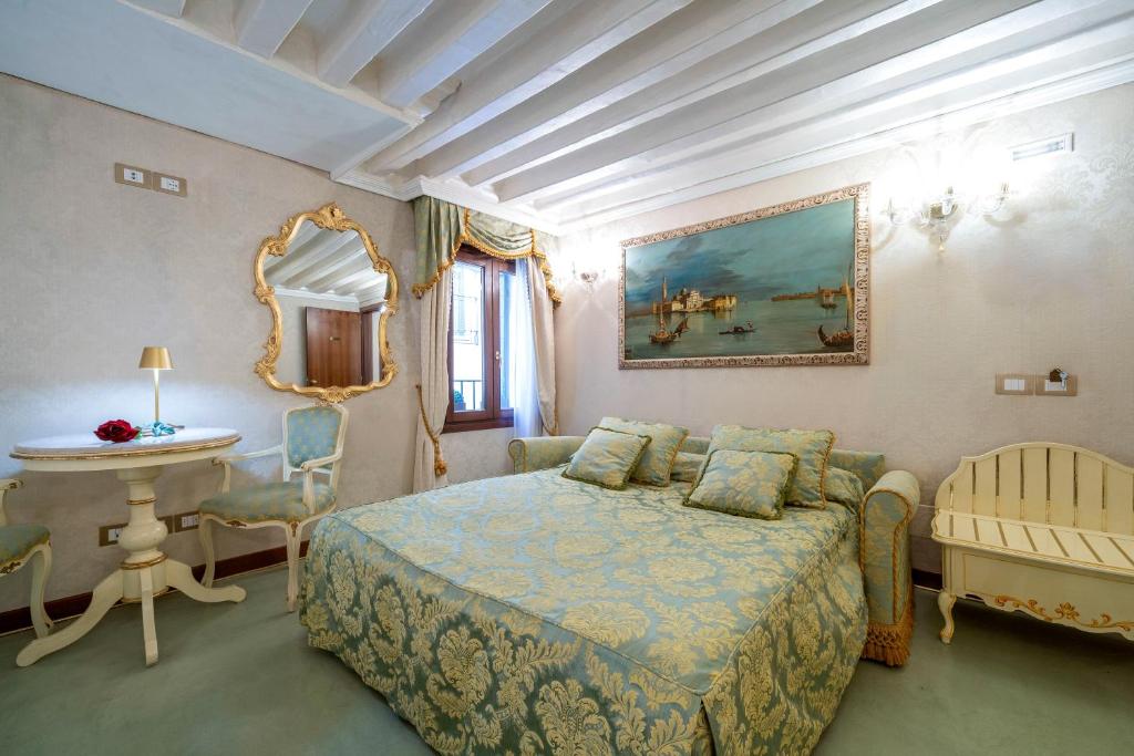 Postel nebo postele na pokoji v ubytování Casa Guggenheim