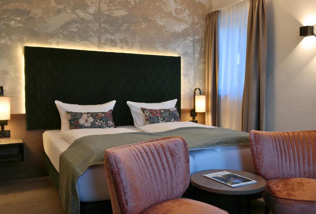 Postel nebo postele na pokoji v ubytování Hotel Vogtland
