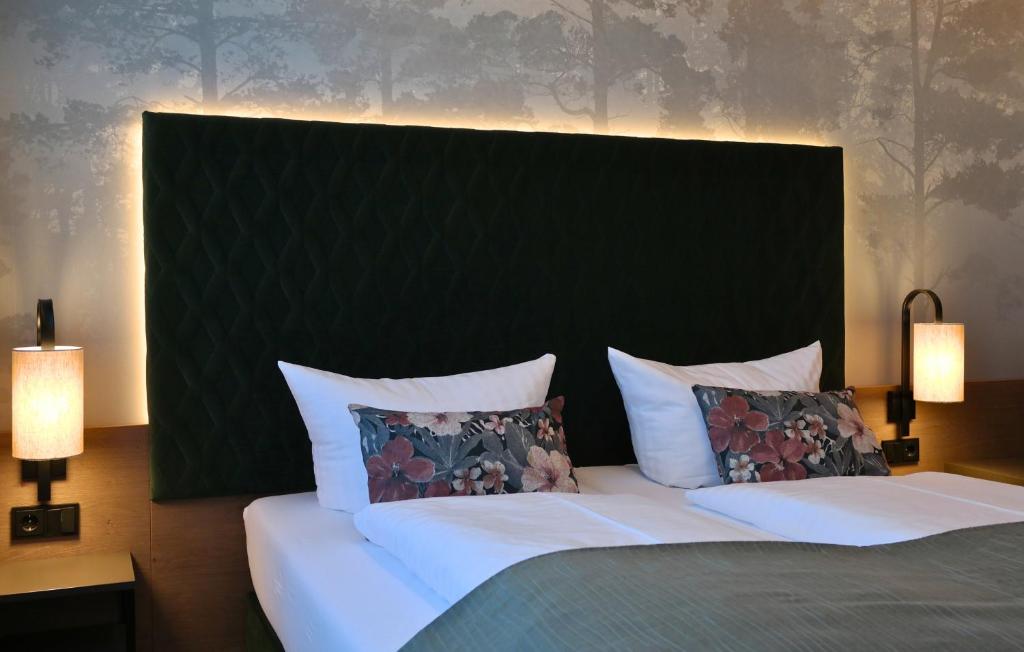 Postel nebo postele na pokoji v ubytování Hotel Vogtland