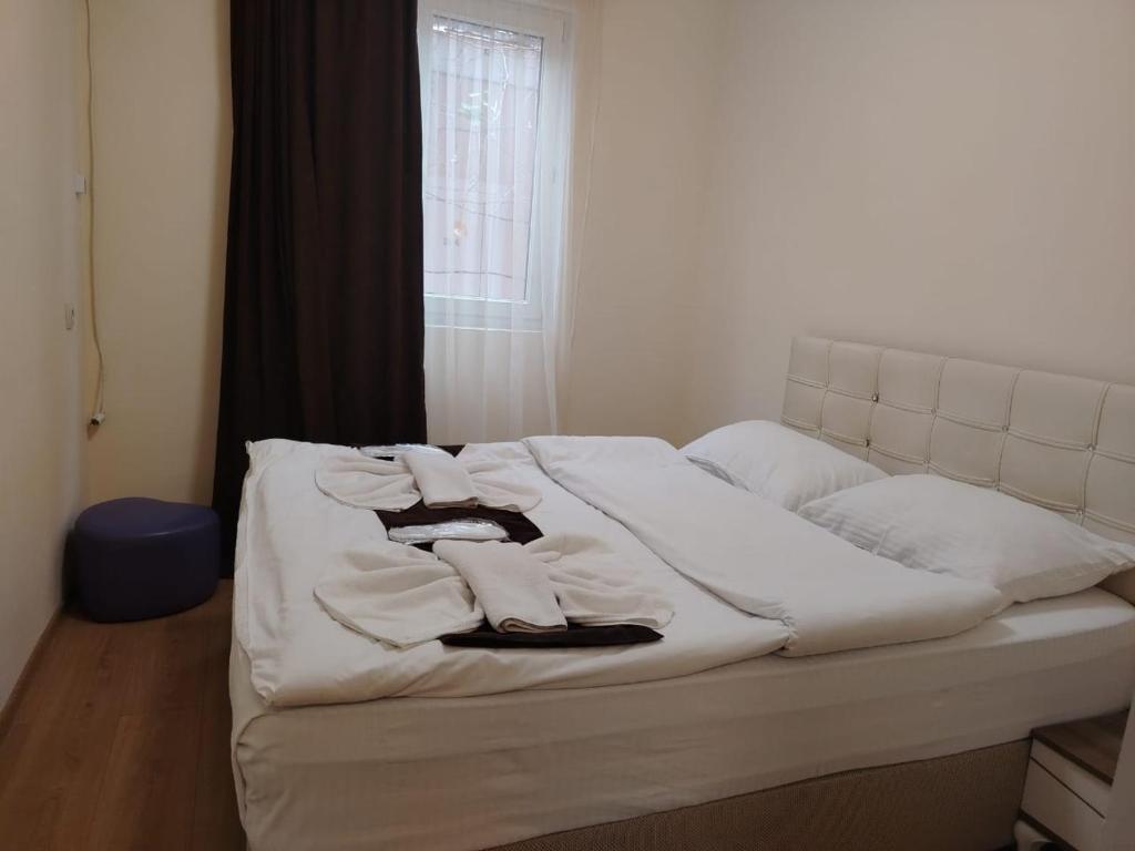 Postel nebo postele na pokoji v ubytování HOTEL IMERETI TBILISi