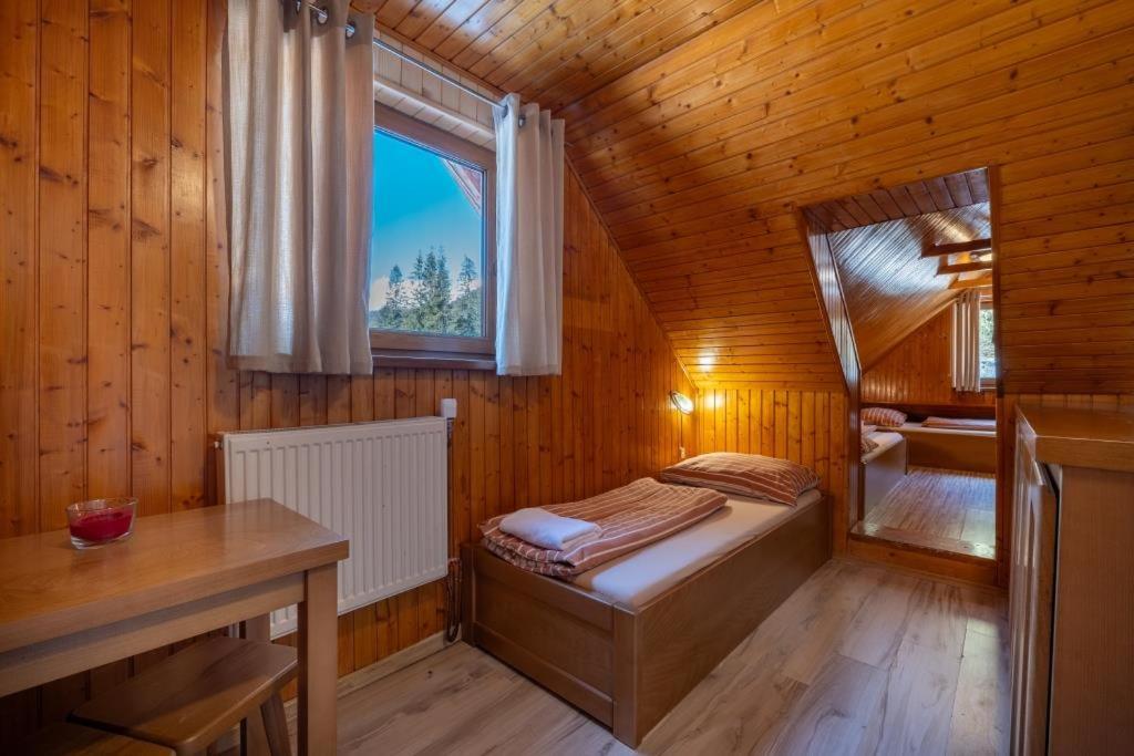 Postel nebo postele na pokoji v ubytování Chata Zverovka