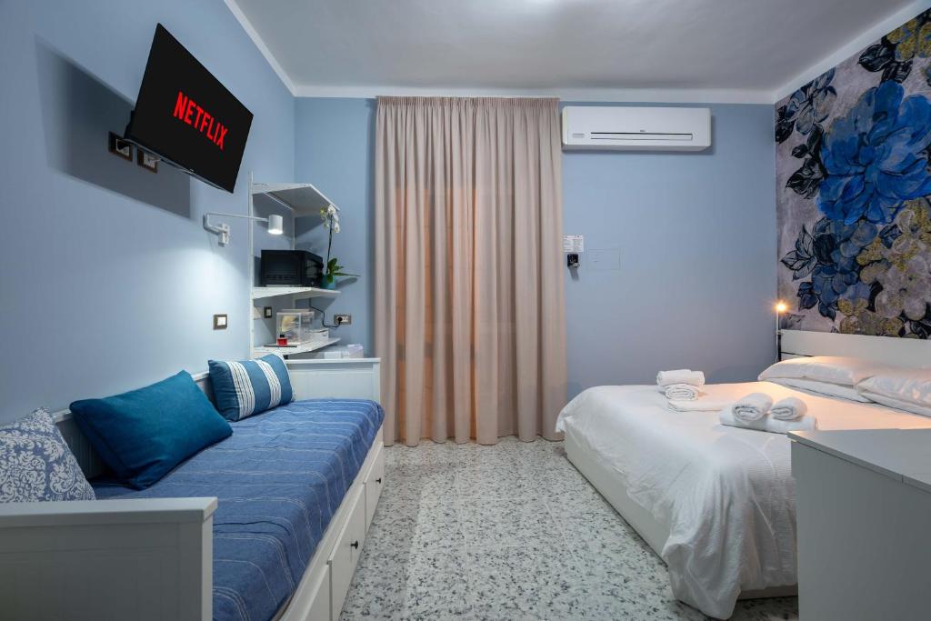 Postel nebo postele na pokoji v ubytování Di Fiore BED BREAKFAST