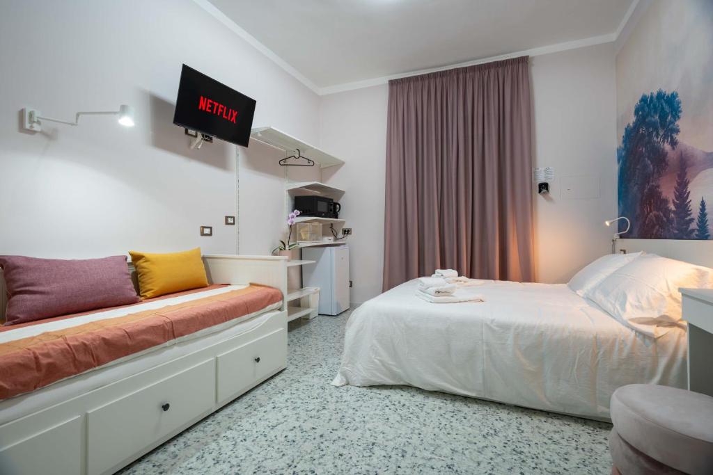 Postel nebo postele na pokoji v ubytování Di Fiore BED BREAKFAST
