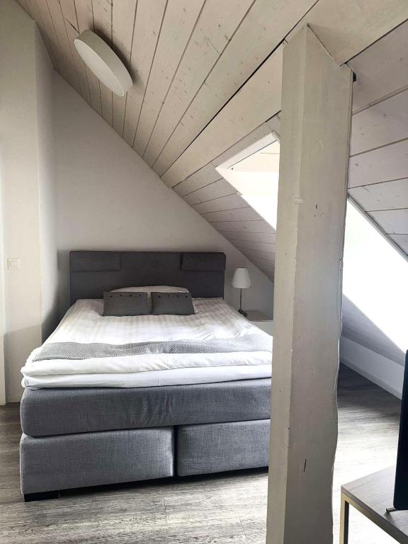 Postel nebo postele na pokoji v ubytování Hôtel de l'Ecluse
