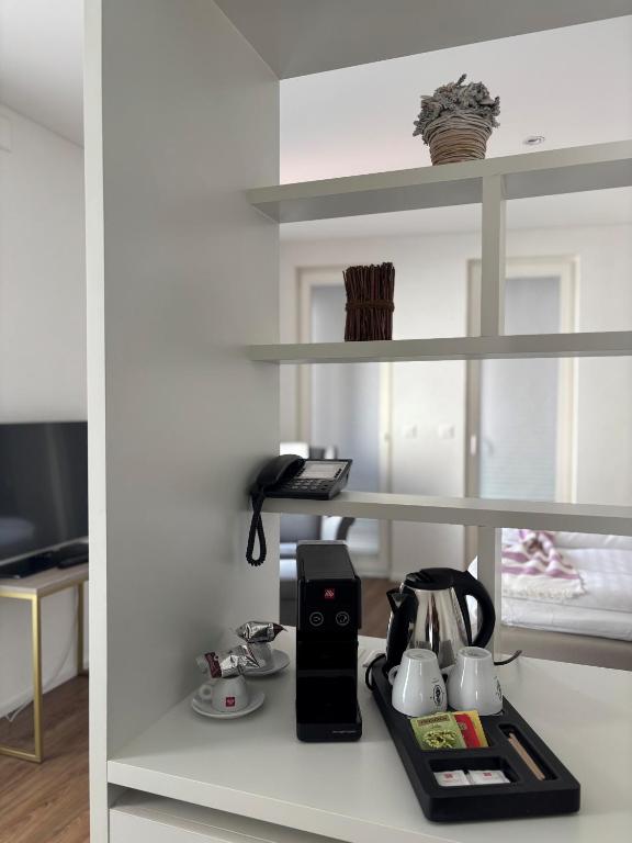 Kuchyň nebo kuchyňský kout v ubytování Hôtel de l'Ecluse