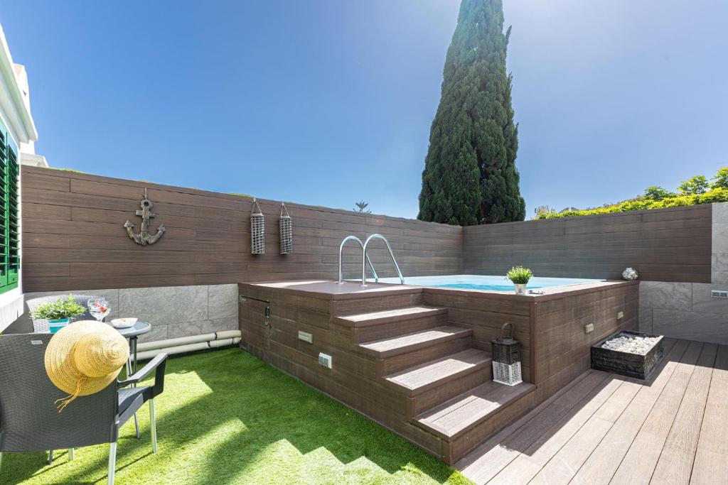 Bazén v ubytování Playa Flor 77 by VillaGranCanaria nebo v jeho okolí