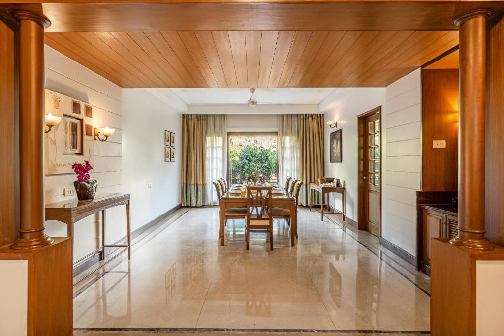 Posezení v ubytování Sliceinn Gulmohar- Near Kempegowda International Airport, Bengaluru