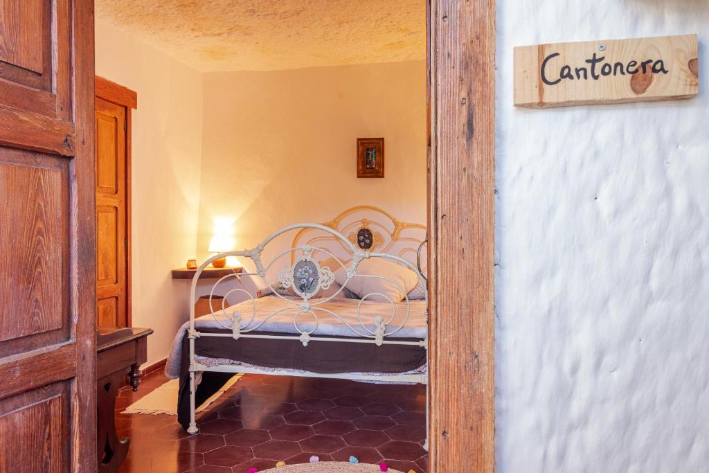 Postel nebo postele na pokoji v ubytování Finca Cuevas La Solana