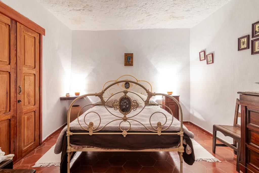 Postel nebo postele na pokoji v ubytování Finca Cuevas La Solana