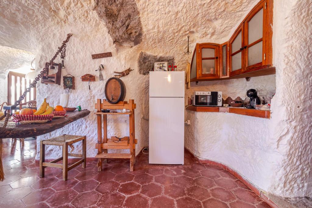 Kuchyň nebo kuchyňský kout v ubytování Finca Cuevas La Solana