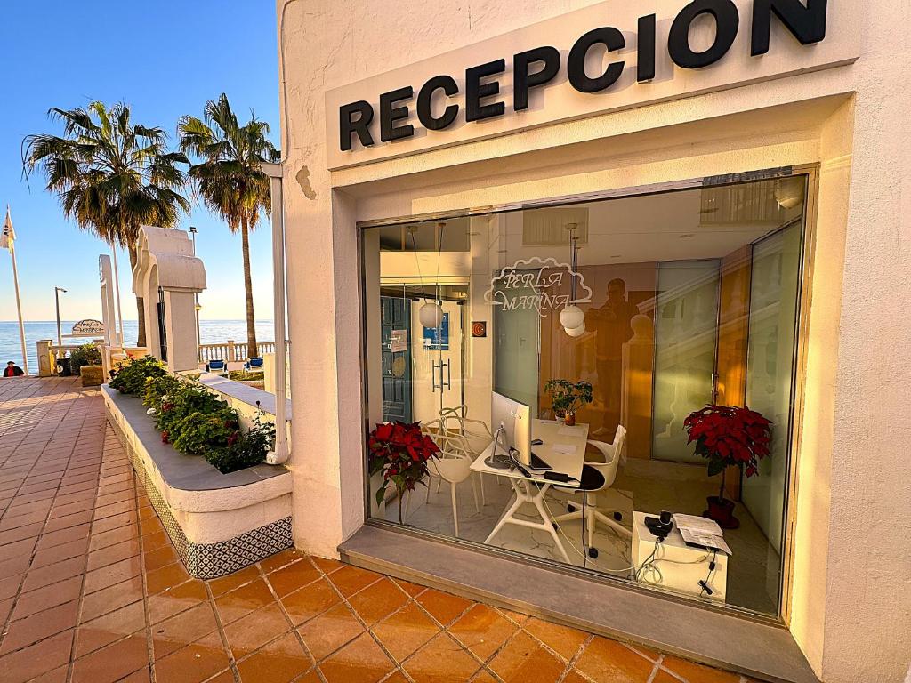 The lobby or reception area at Apartamentos Perla Marina