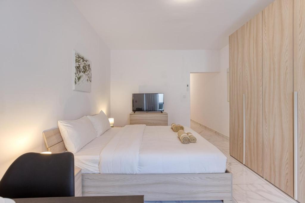 Letto o letti in una camera di New Studio in Msida
