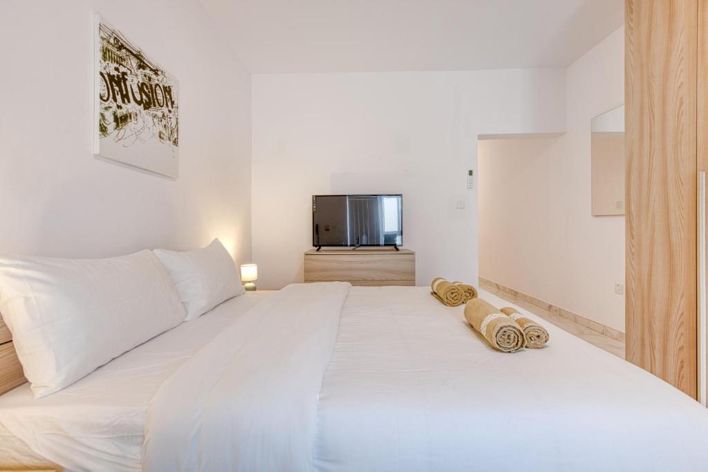Letto o letti in una camera di New Studio in Msida