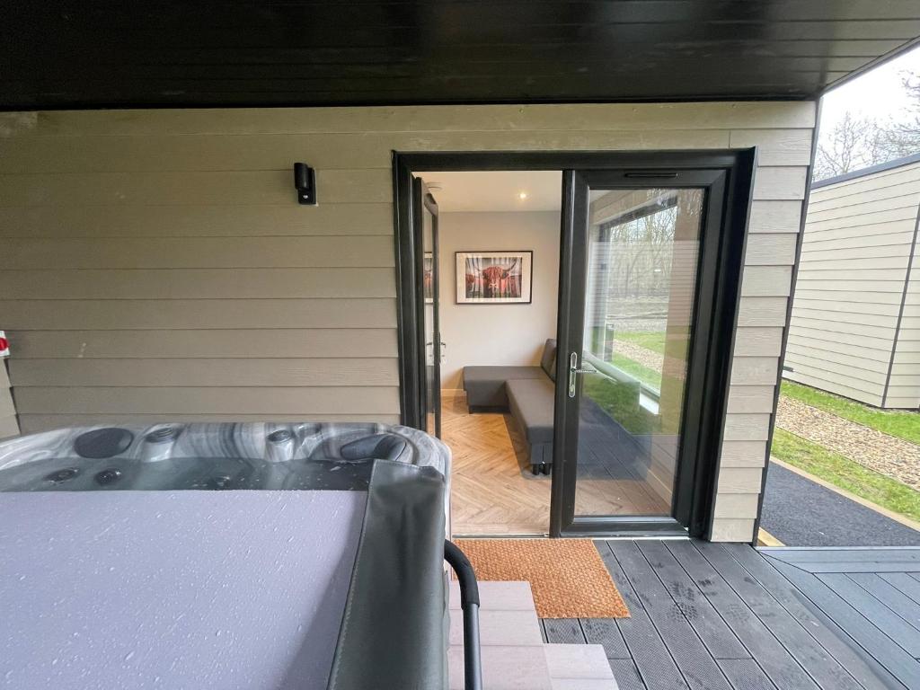 Zona d'estar a River Logie Lodges