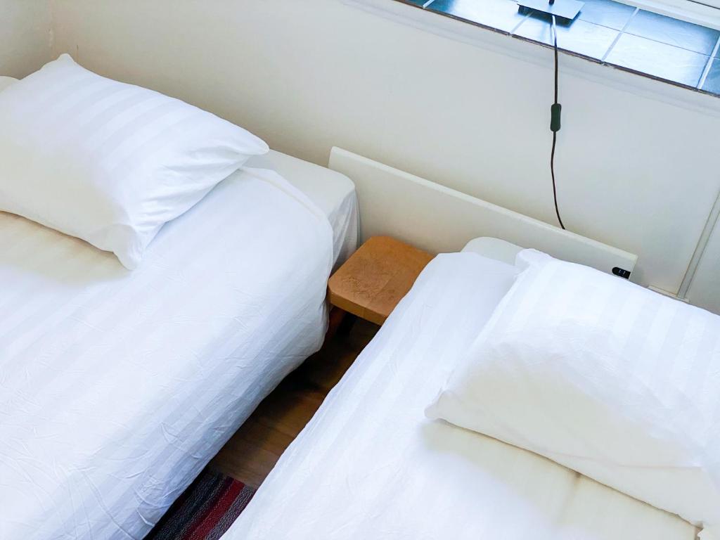 Postel nebo postele na pokoji v ubytování Viborg Guesthouse - Billig Overnatning Viborg