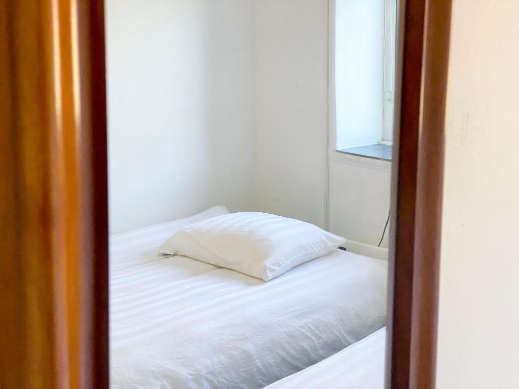 Postel nebo postele na pokoji v ubytování Viborg Guesthouse - Billig Overnatning Viborg