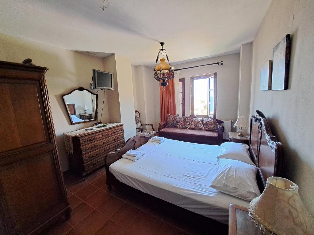 Postel nebo postele na pokoji v ubytování Smaragdi Luxury Apartments