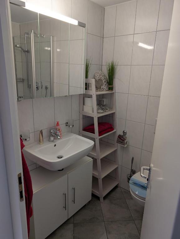 Koupelna v ubytování Appartement Allgäu-Sonne mit Sauna und Pool
