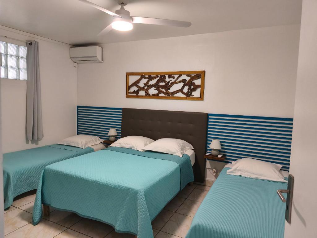 Postel nebo postele na pokoji v ubytování Résidence B&L Lagon : T3 Alizés