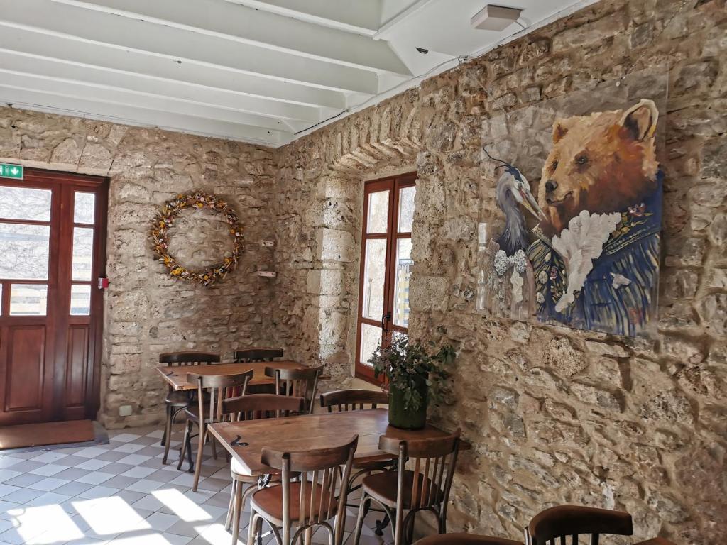 Posezení v ubytování Le Moulin De La Pipe - Logis Hotel Restaurant