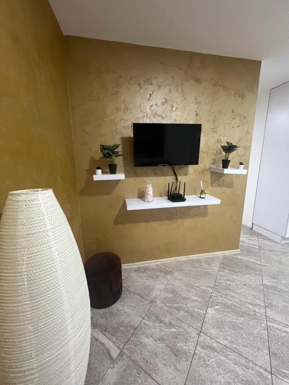 Μια τηλεόραση ή/και κέντρο ψυχαγωγίας στο Aurora apartment