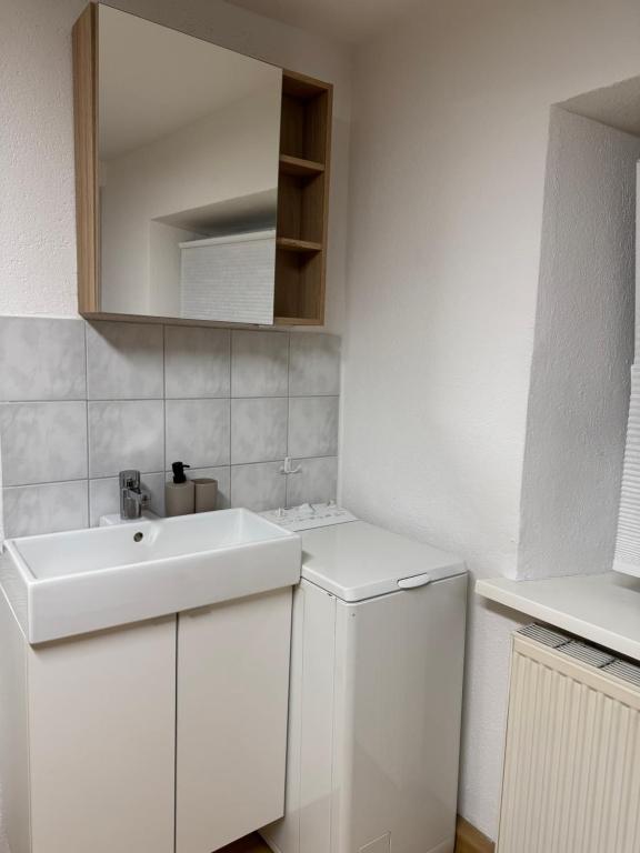 Kuchyň nebo kuchyňský kout v ubytování Sleep & Stay